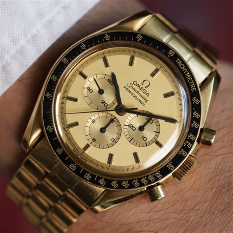 red gold speedmaster watch